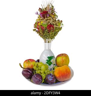 Symbols of a Fruitful Summer: A Bouquet for The Slavic Holiday Poppy Seeds, Apples, Peaches, Grapes and Plums On a Plate. Isolated On White Background Stock Photo