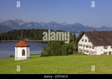 geography / travel, Germany, Bavaria, Rieden at Lake Forggen (Forggensee), farm with chapel Hegratsrie, Additional-Rights-Clearance-Info-Not-Available Stock Photo