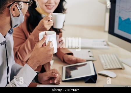 Business colleagues discussing reports Stock Photo