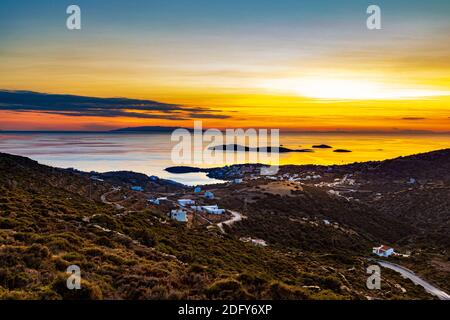 The bay of the resort of Batsi on the Greek Cyclades island of Andros in sunset Stock Photo