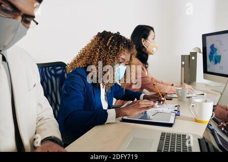 Managers working with reports Stock Photo
