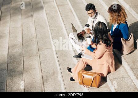 Entrepreneurs having outdoor meeting Stock Photo