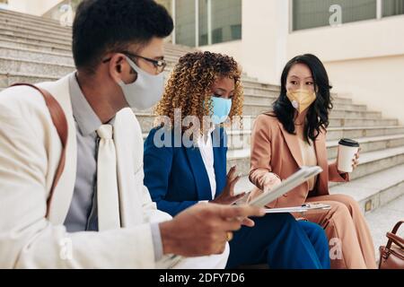 Talking serious business people Stock Photo