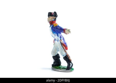 Image of handmade vintage souvenir - tin soldier on the white background Stock Photo