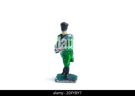 Image of handmade vintage tin soldier on the white background Stock Photo