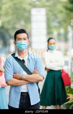 Confident man in medical mask Stock Photo