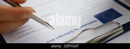 Focus on mans hand Stock Photo
