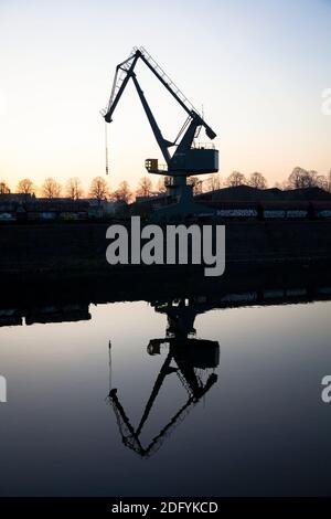 loading crane in the Rhine harbor in the district Deutz, Cologne, Germany. Stock Photo