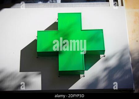 Sign on the exterior wall of a pharmacy store in Athens, Greece. Stock Photo
