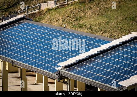 Closeup of a shed with many solar panels on the roof. Lessinia Plateau, Verona Province, Veneto, Italy, Europe. Stock Photo
