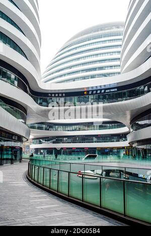 China, Beijing, Dongcheng District: Galaxy Soho building designed by architect Zaha Hadid. Stock Photo