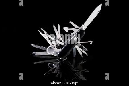 Swiss army knife victorinox swisschamp on black background Stock Photo