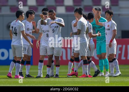 Doha, Qatar. 7th Dec, 2020. Players of Shanghai SIPG FC react prior to the round 16 match of the AFC Champions League between Shanghai SIPG FC of China and Vissel Kobe of Japan in Doha, Qatar, Dec. 7, 2020. Credit: Nikku/Xinhua/Alamy Live News Stock Photo