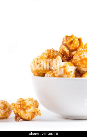 Sweet caramel candy popcorn in a bowl white background Stock Photo