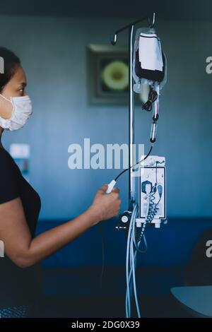 Nurse in hospital with blood products, infusion of donor blood. Stock Photo