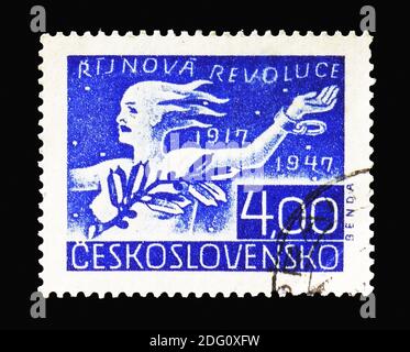 MOSCOW, RUSSIA - AUGUST 18, 2018: A stamp printed in Czechoslovakia shows Alegorie revoluce, Russian October Revolution, 30th Anniversary serie, circa Stock Photo