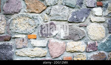 Fragment of a wall from a chipped stone Stock Photo