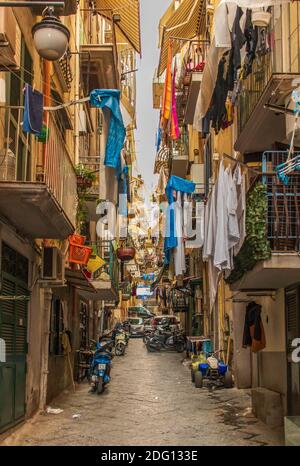 An intricate maze of narrow streets and alleys, the Spanish Neighborhoods (Quartieri Spagnoli) are the heart of Naples. Here's a glimpse Stock Photo