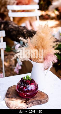 delicious nonalcoholic Raspberry Mojito which combines fresh raspberries, juicy lime and crisp mint Stock Photo