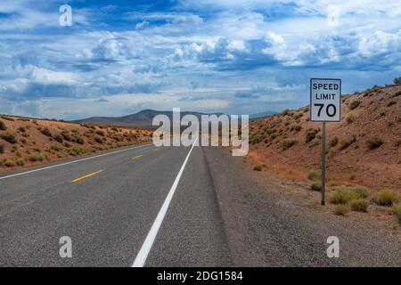 View of the US route 50 (known as the Loneliest Road in America) in the State of Nevada, USA. Concept for travel in America and road trip. Stock Photo