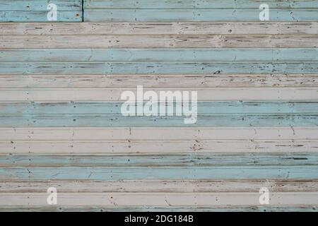 pastel blue and white painted stripes on wooden boards. Background. Stock Photo