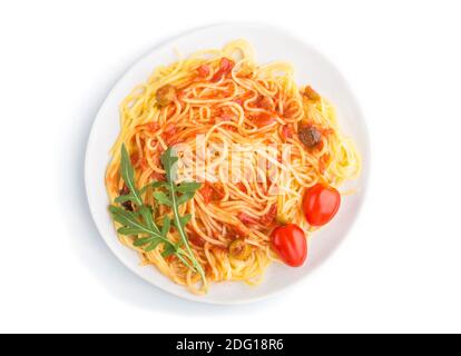 Corn noodles with tomato sauce and arugula isolated on white background. Top view, flat lay. Stock Photo