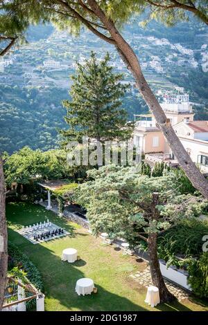 The stunning garden of Villa Eva in the town of Ravello Italy. A renowned wedding venue and privately owned villa. Landscaped garden and tall trees. Stock Photo