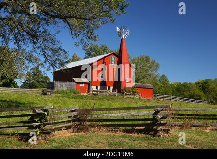 Historic Red Barn. The barn was built in the 1880's and featured a unique enclosed windmill tower. Carriage Hill Metropark, Huber Heights or Dayton, O Stock Photo