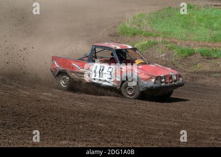 Race for survival. Red car on the track Stock Photo