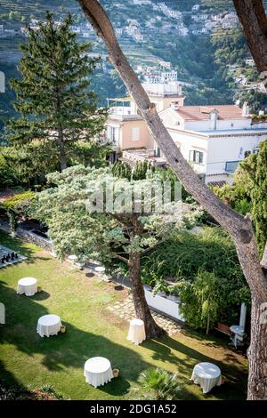 The stunning garden of Villa Eva in the town of Ravello Italy. A renowned wedding venue and privately owned villa. Landscaped garden and tall trees. Stock Photo