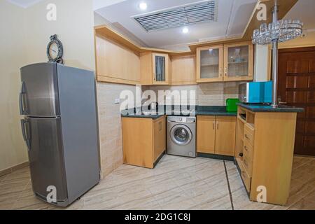 Interior design decor showing modern kitchen and appliances in luxury apartment showroom Stock Photo