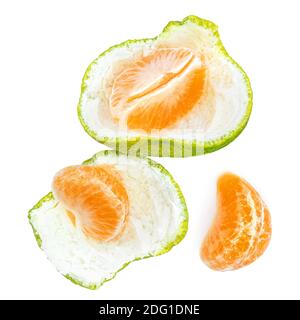 Peeled Mandarine fruit pieces   (clementine, tangerin) slices  isolated on white background. Top view. Flat lay Stock Photo