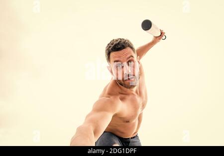 Victory requires payment in advance. Bandit aggression anger. Muscular man fighting. Violence and attack. Street fight. Attack and defence. Get ready attack. Man with baseball bat. Hooligan hits bat. Stock Photo