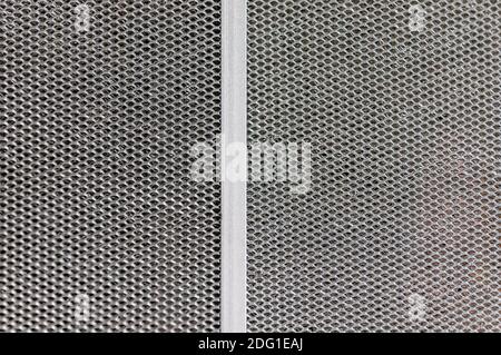 Aluminium mesh pattern on black gradient background vector Stock Photo