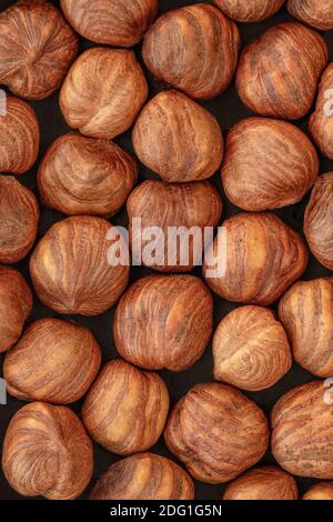 Hazelnuts heap as a Background. Top view. Flat lay. Hazel nuts Wallpaper Stock Photo