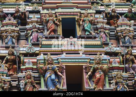 Colorful  holy figure on the facade outside from the hindu Temple in Malaysia. Stock Photo