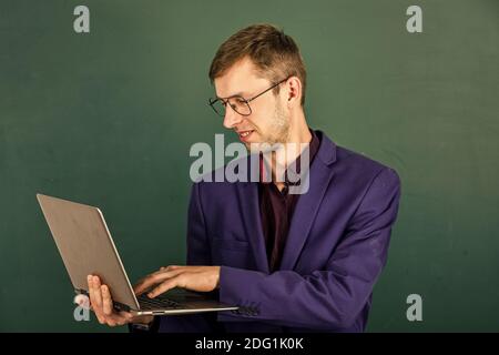 Teacher using modern software self education, preparing for lesson concept. Stock Photo