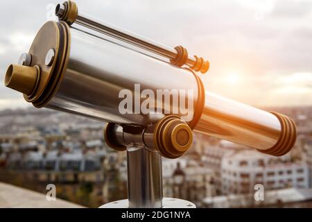 Telescope over the famous city in a wonderful place. Stock Photo