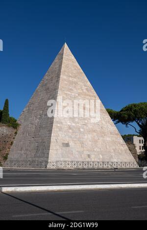 Pyramid of Cestius (Piramide di Caio Cestio or Cestia) in city of Rome, Italy, ancient tomb of Gaius Cestius, circa 18–12 BC. Stock Photo