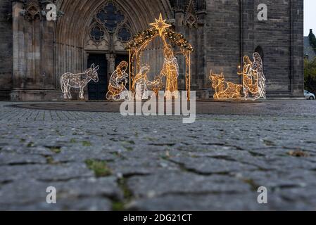 Magdeburg, Germany. 01st Dec, 2020. There is an illuminated nativity scene on the cathedral square. It is a donation of the Protestant Church District of Magdeburg to the city. The nativity scene belongs to the world of lights, which is planned until February 2, 2021. Credit: Stephan Schulz/dpa-Zentralbild/ZB/dpa/Alamy Live News Stock Photo