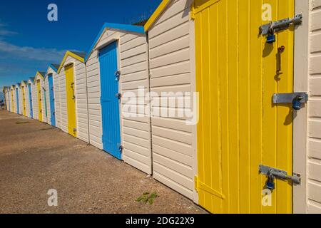 A row of beach huts in Westgate Bay, Margate, Kent Stock Photo