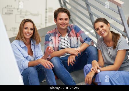Group of students relaxing in the campus Stock Photo