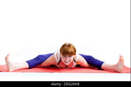 Middle aged woman exercise yoga Stock Photo