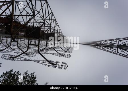 Soviet radar Duga in foggy weather. Russian woodpecker - over-the-horizon radar station near Chernobyl Stock Photo