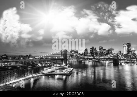 Amazing night in New York City - Manhattan Skyline and Brooklyn Bridge Stock Photo