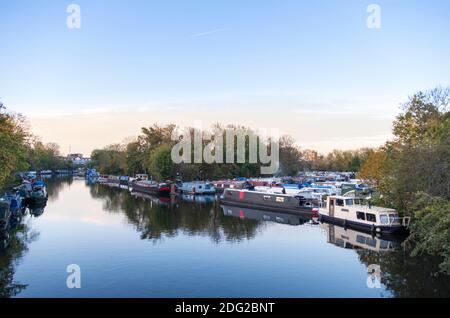 Europe, UK, England, London, the River Lea (Lee) in East London, houseboats, reflection in still water, tranquil scene, Autumn view Stock Photo