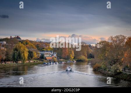 Europe, UK, London, Richmond, an affluent residential suburb in west London, Thames River, Autumn, boats on the river, trees in fall, tranquil scene