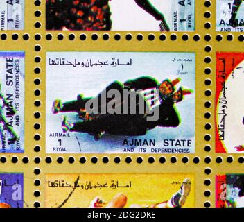 MOSCOW, RUSSIA - NOVEMBER 10, 2018: A stamp printed in Ajman shows Luge, Winter Olympics serie, circa 1973 Stock Photo