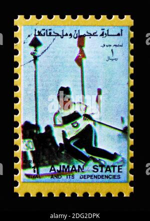 MOSCOW, RUSSIA - NOVEMBER 10, 2018: A stamp printed in Ajman shows Slalom, Winter Olympics serie, circa 1973 Stock Photo