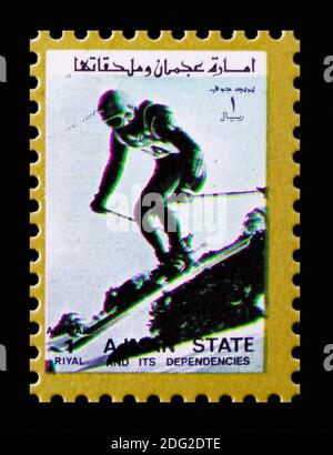 MOSCOW, RUSSIA - NOVEMBER 10, 2018: A stamp printed in Ajman shows Slalom, Winter Olympics serie, circa 1973 Stock Photo